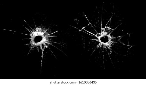 white cracks in the glass isolated on a black background