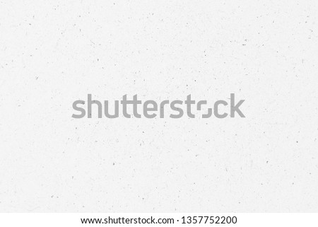White craft spotted paper texture as background