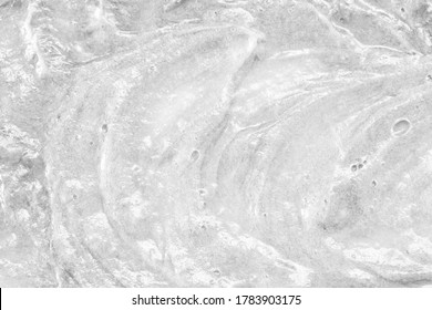 White Cream Texture. Surface Of Yogurt And A Smoothie Of Whipped Cream Smoothie. Background Texture Of Masks And Scrubs For Face And Body. Pearlescent Silver Surface Of The Foam.