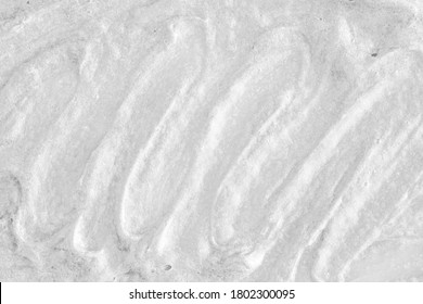 White Cream Texture. Surface Of Yogurt And A Smoothie Of Whipped Cream Smoothie. Background Texture Of Masks And Scrubs For Face And Body. Pearlescent Silver Surface Of The Foam.