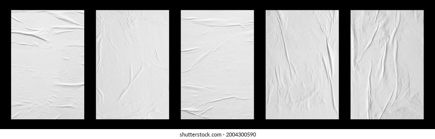 white crumpled and creased glued paper poster set isolated on black background - Shutterstock ID 2004300590