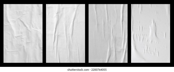 white crumpled and creased glued paper poster set isolated on black background