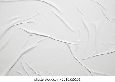 white crumpled and creased glued wrinkled paper poster texture background