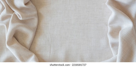 White Crumpled Linen Fabric Texture Background. Natural Off White Wavy Linen Organic Eco Textiles Canvas Background. Top View