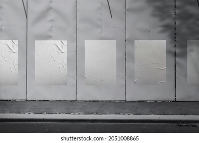 White crumpled paper poster template. Glued paper banner mockup. Empty street art mockup. Clear urban glued advertising on wall background