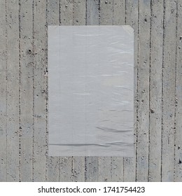 White Crumpled Paper Wheatpaste Poster On Concrete Wall Background. Design Element.