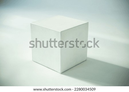White cube on a white background
