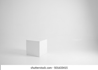 white cube on a white background (in the studio on the cyclorama)