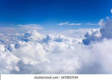 White cumulus clouds on clear blue sky background closeup, overcast skies backdrop, fluffy cloud texture, beautiful sunny cloudscape heaven, ozone layer illustration, scenic cloudy weather, copy space - Powered by Shutterstock