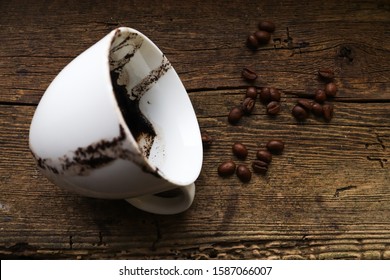 White Cup With Coffee Beans On Wood Background From Above, Fortune Telling, Turkish Coffee Grounds Reading, Tasseography, Predicting The Past The Future, Text Space