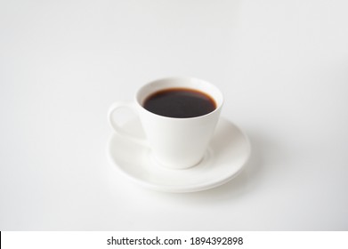 White Cup Of Coffee On The White Background.