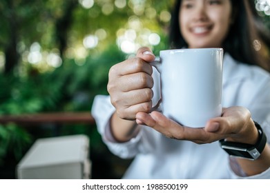 White Cup On Hand In Relax Time