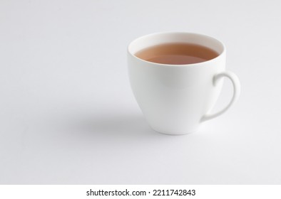 White cup and plate with green tea isolated on a white background
 - Shutterstock ID 2211742843