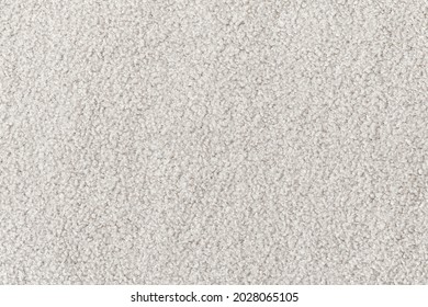 White curly wool seamless texture background. texture with short factory material.