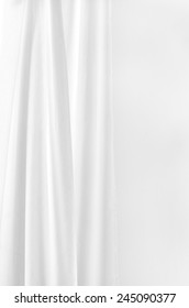 White Curtain On White Wall Background