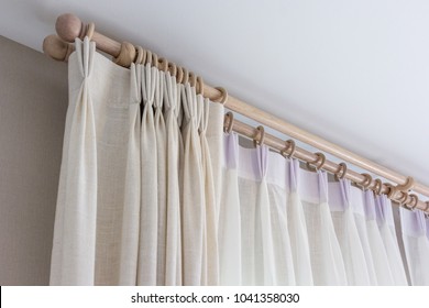 The white curtains with ring-top rail, Curtain interior decoration in living room - Shutterstock ID 1041358030