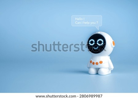 White cute AI robot assistant with friendly smile and  greeting speech bubble on blue background. Chatbot AI customer support, virtual assistance, automation, technology and communication concepts.