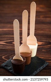 White And Dark Chocolate. Spoon With Dark, Milk And White Chocolate