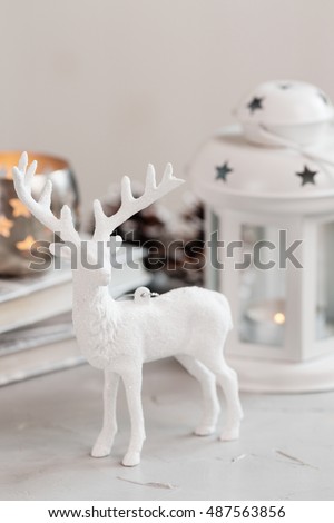 white deer christmas decoration on light background christmas card shallow focus - White Deer Christmas Decoration white deer christmas decoration on light background christmas card shallow focus - White Deer Christmas Decoration