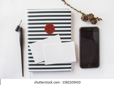 White Desktop Mockup. Diary, Phone, Calligraphy Pen And Blank Business Cards. Home Office Flatlay