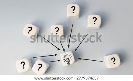 White Dice Cubes with Question Marks and Arrows Pointing to Light Bulb Icon for Brainstorming and Creative Problem Solving. 