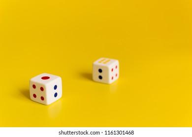 white dice on a yellow background different values of numbers - Shutterstock ID 1161301468