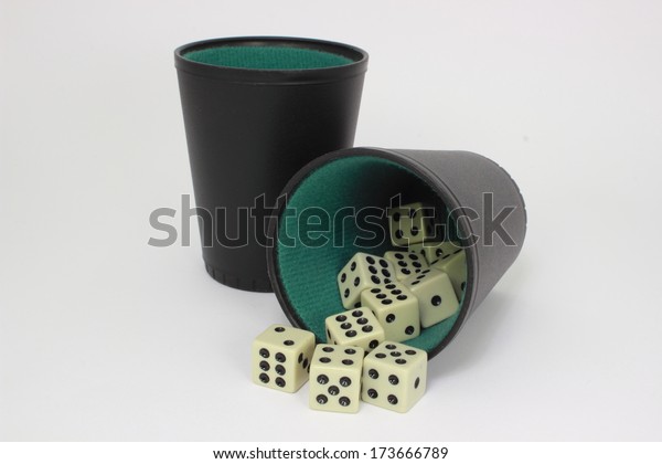 White\
dice with two black and green dice cups -\
isolated