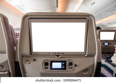 White Display Screen With Joystick On Rear Seat In Passenger Plane