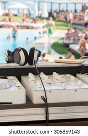 White Dj Mixer On A Swimming Pool Party