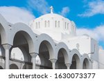 White dome of Orthodox Metropolitan Cathedral in Fira (Thera) of Ypapanti, on Santorini island 