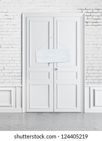 White Door With An Empty Plate