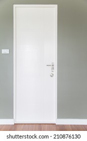 White Door And Gray Wall