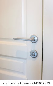 White Door And Silver Doorknob In The Apartment