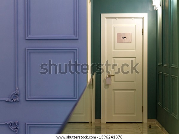 White Door Spa Salon Blue Green Royalty Free Stock Image