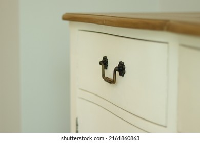 White Drawer With Vintage Hilt Or Grip For Studio, Office, House Decoration. Tray And Aluminum Handle For Storing, Towels, Utensils, Wares. Close Up Shelf In Room, Walk In Closet. Wooden Shelves 