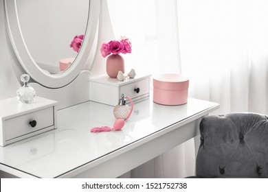 White Dressing Table Near Window In Light Room