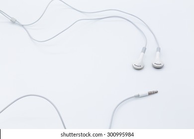 White Earbuds Isolated On White Background