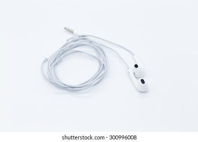 White Earbuds Isolated On White Background