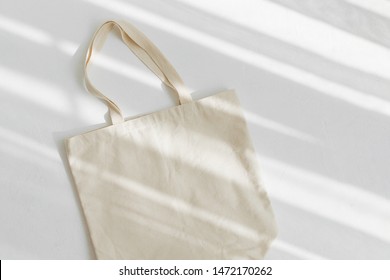 White eco bag mockup. Blank Shopping sack with copy space. Canvas tote bag. Eco friendly / Zero waste concept. - Powered by Shutterstock