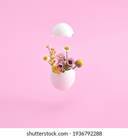 White egg and spring flowers. Easter minimal on pink background. Happy easter, spring or summer, food concept - Powered by Shutterstock