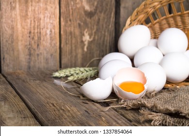 White eggs from the basket and broken egg
