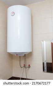 White Electric Boiler In The Bathroom