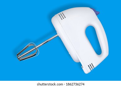 White Electric Mixer On A Blue Background.