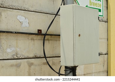 White Electrical Panel Box Installed On The Street Lighting Lamp Post