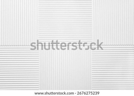 white embossed ceramic tile with horizontal and vertical geometric line pattern, minimalist ribbed tile for backgrounds, architecture, and modern kitchen or bathroom interior