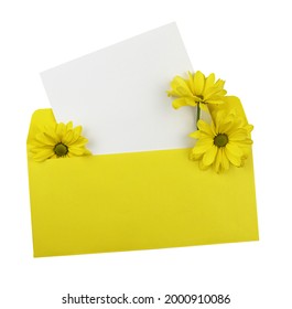 White Empty Card And Yellow Chrysanthemum Flowers In A Yellow Paper Envelope Isolated On White Background. Mock Up. Flat Lay. Top View.