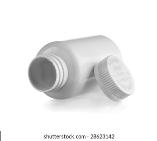 White Empty Medicine Bottle Lay Down With The Cap At Side