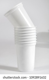 white empty plastic pails isolated