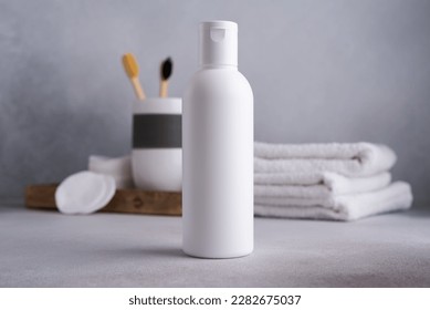 White empty shampoo or lotion bottle for mock-up in Scandinavian bathroom interior - Shutterstock ID 2282675037
