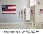 White empty voting booths at polling station with American flag. Interior of vote center ready for presidential elections in the United States. Democracy and election day concept.